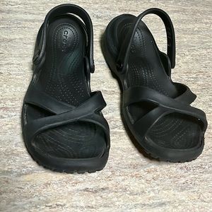 Crocs open toe sandals. Size 8 but fits like a 7.
